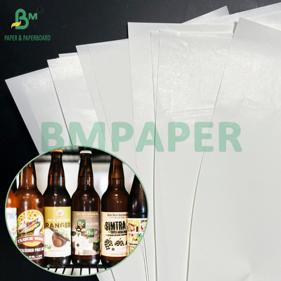 65gsm 70gsm জলরোধী ভিজা শক্তি C1S লেবেল কাগজ বিয়ার বোতল স্টিকার জন্য